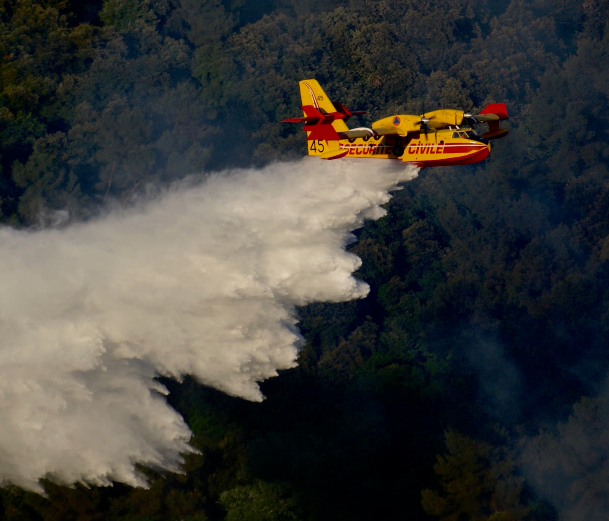 Canadair CL-415 firefighting aircraft dropping water in France