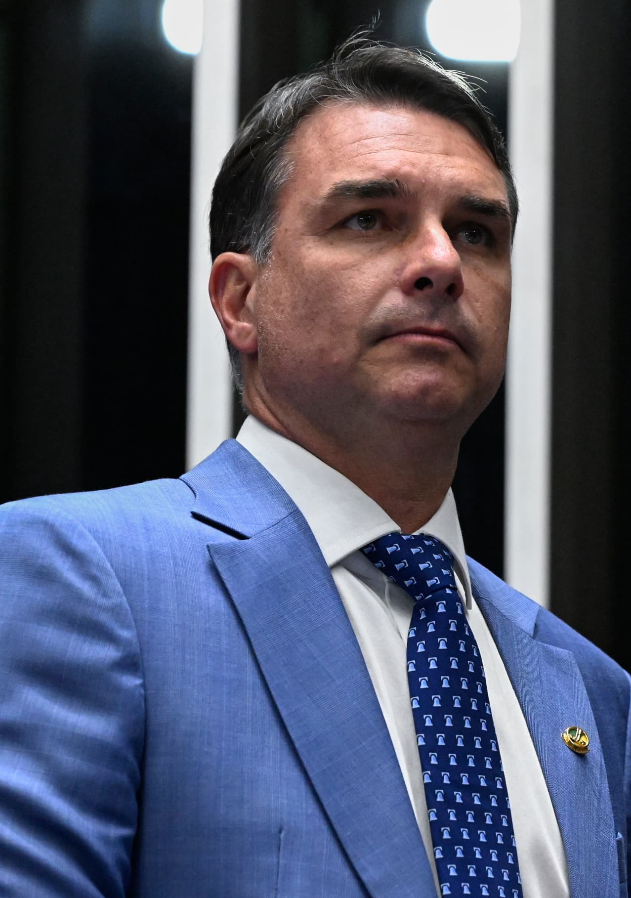 Flávio Bolsonaro speaking at a public event