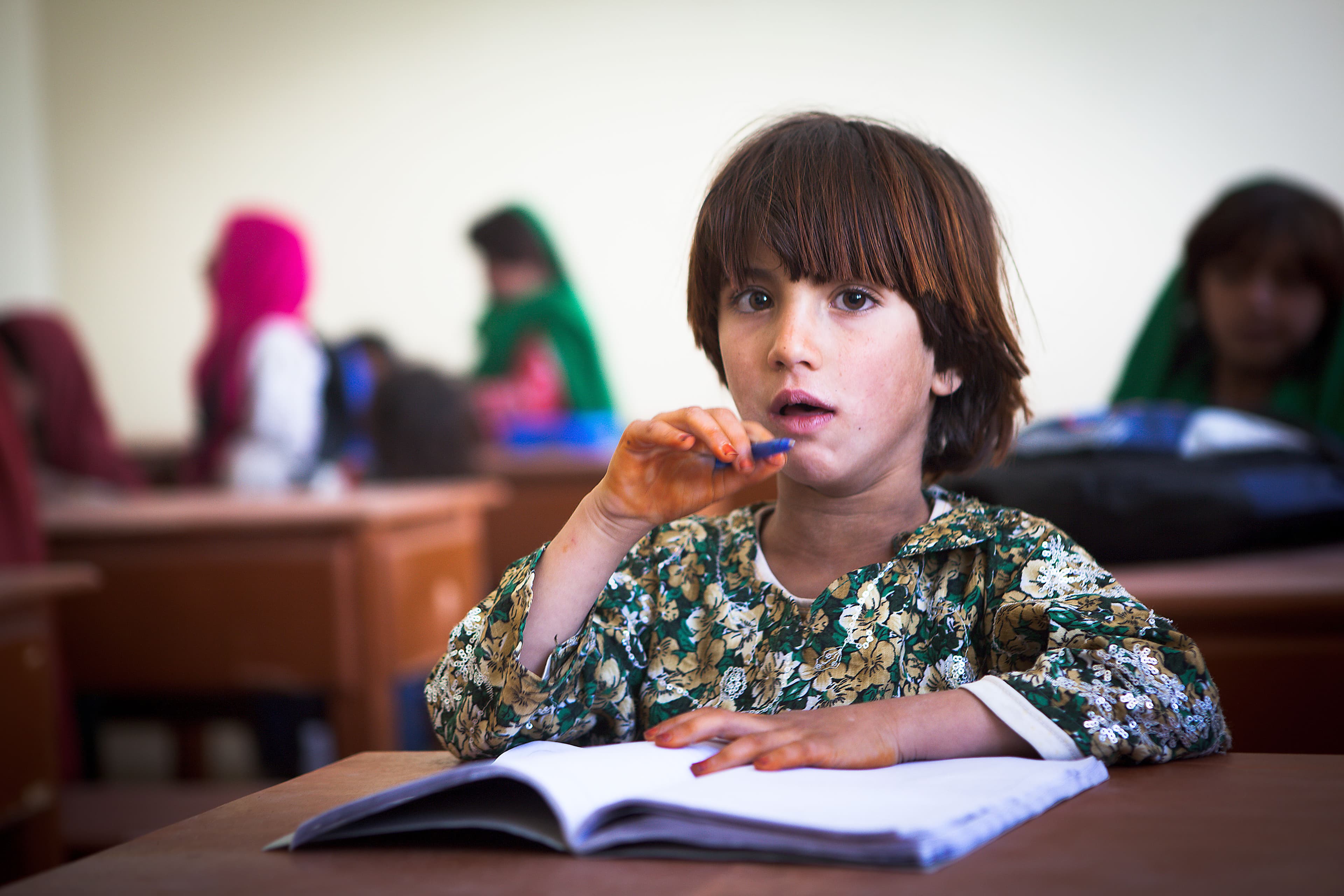 Girls attend a village school in Afghanistan